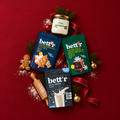 Little Elves’ Baking Club, pachet BIO de Crăciun cu mix pentru turtă dulce, mix pentru negresă, băutură din orez Bett’r și ulei de cocos Dragon Superfoods.